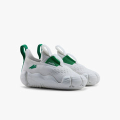 A pair of crisp white Aretto kids' shoes with flexible white segmented soles, displayed side-by-side against a white background. (Sizes S1 & S2)