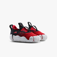A pair of Space Surfer red Aretto kids' shoes with flexible white segmented soles, displayed side-by-side against a white background. (Sizes S1 & S2)