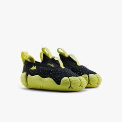 A pair of multicolor Aretto kids' shoes with flexible white segmented soles, displayed side-by-side against a white background. (Sizes S1 & S2)