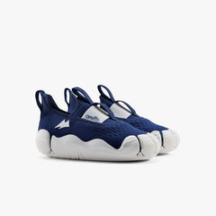 A pair of navy blue Aretto kids' shoes with flexible white segmented soles, displayed side-by-side against a white background. (Sizes S3 & S4)